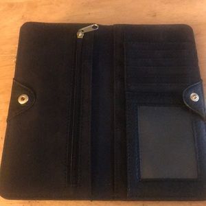 Woman’s wallet Relic